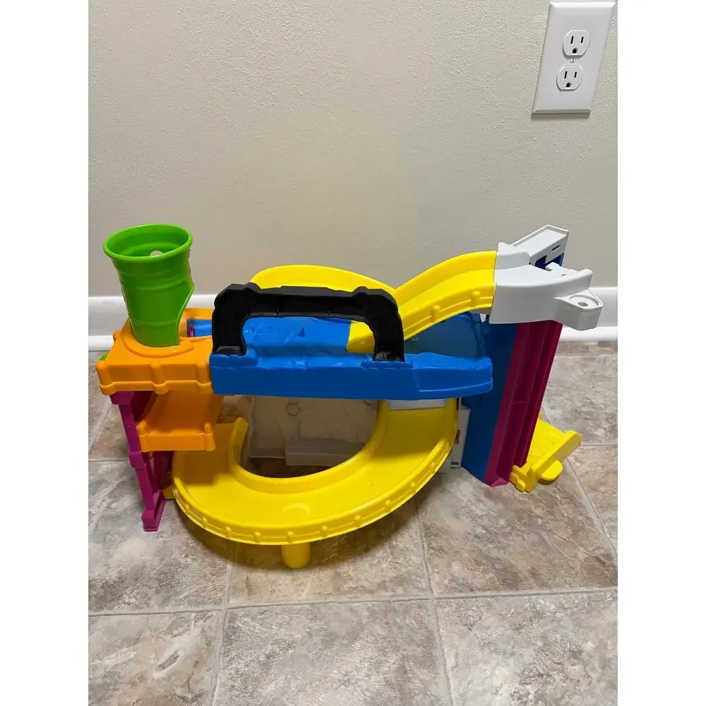 Little People Wheelies DC Super Friends Race and Chase Batcave Playset